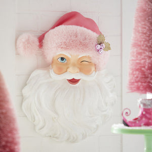 Santa's Face wearing his Pink Santa Hat with his cheeky wink