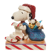 Load image into Gallery viewer, Peanuts by Jim Shore - Santa Snoopy with List and Bag