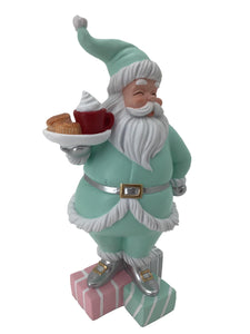 Candy Mint Coloured Santa Holding a Tray of Cakes