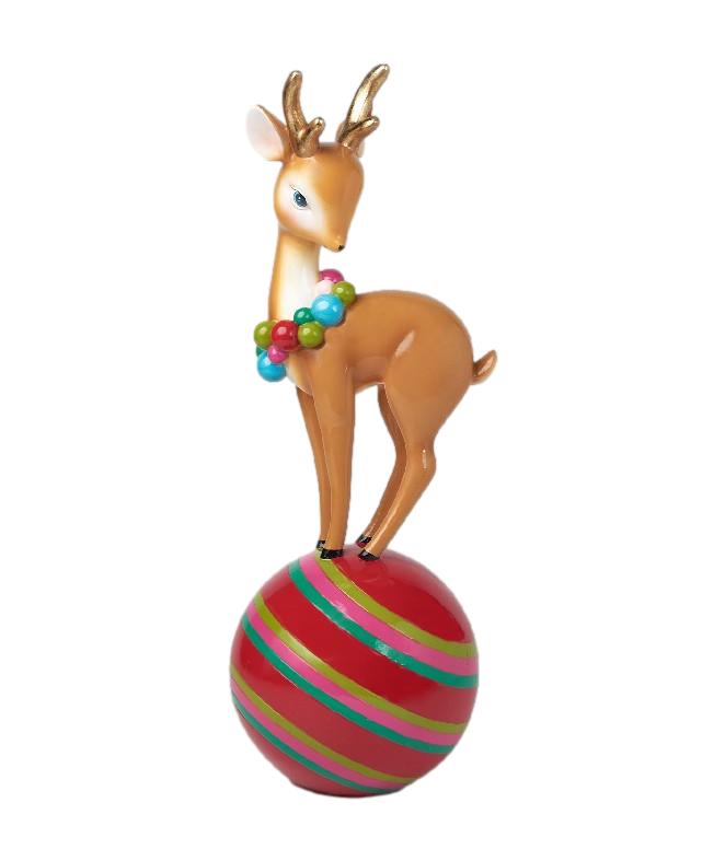 Vintage Reindeer wearing her bright Necklace Sitting on a bright Bauble