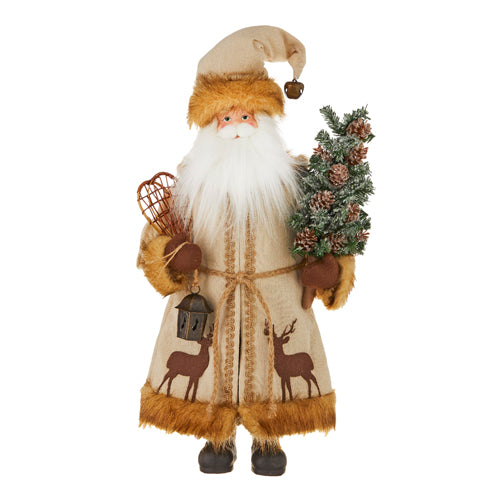 Santa Holding Vintage ski shoes and Tree