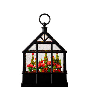 Christmas Flowers and Cardinals that Light up in a Water Green House
