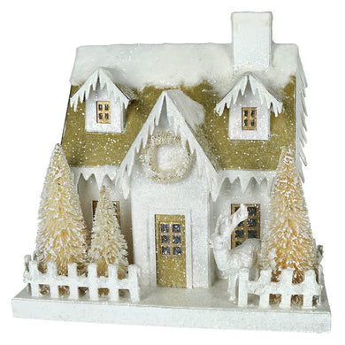 Peaceful White and Gold Snow Covered House