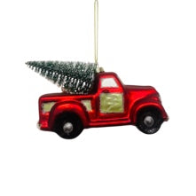 Red Ute Carrying a Christmas Tree